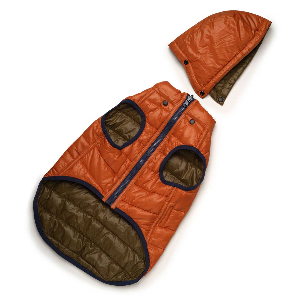 bottom view of orange side of jacket with detached hood