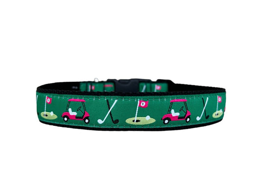 close up of collar. dark green background with golf cart, golf clubs, and golf green around