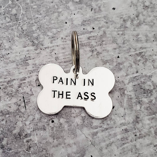 "PAIN IN THE ASS" Bone - Shaped Tag - Ruffingdales, Inc