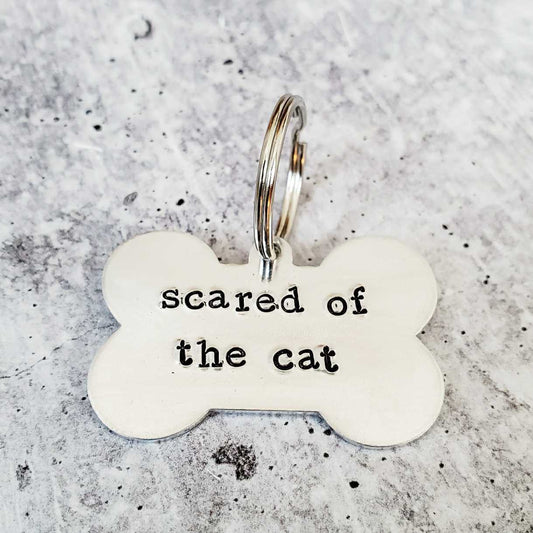 "scared of the cat" Bone - Shaped Tag - Ruffingdales, Inc