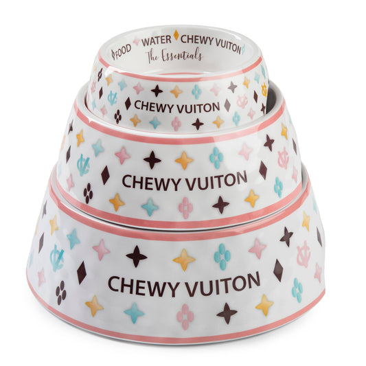 stack of 3 different sized white Chewy Vuiton dog bowls