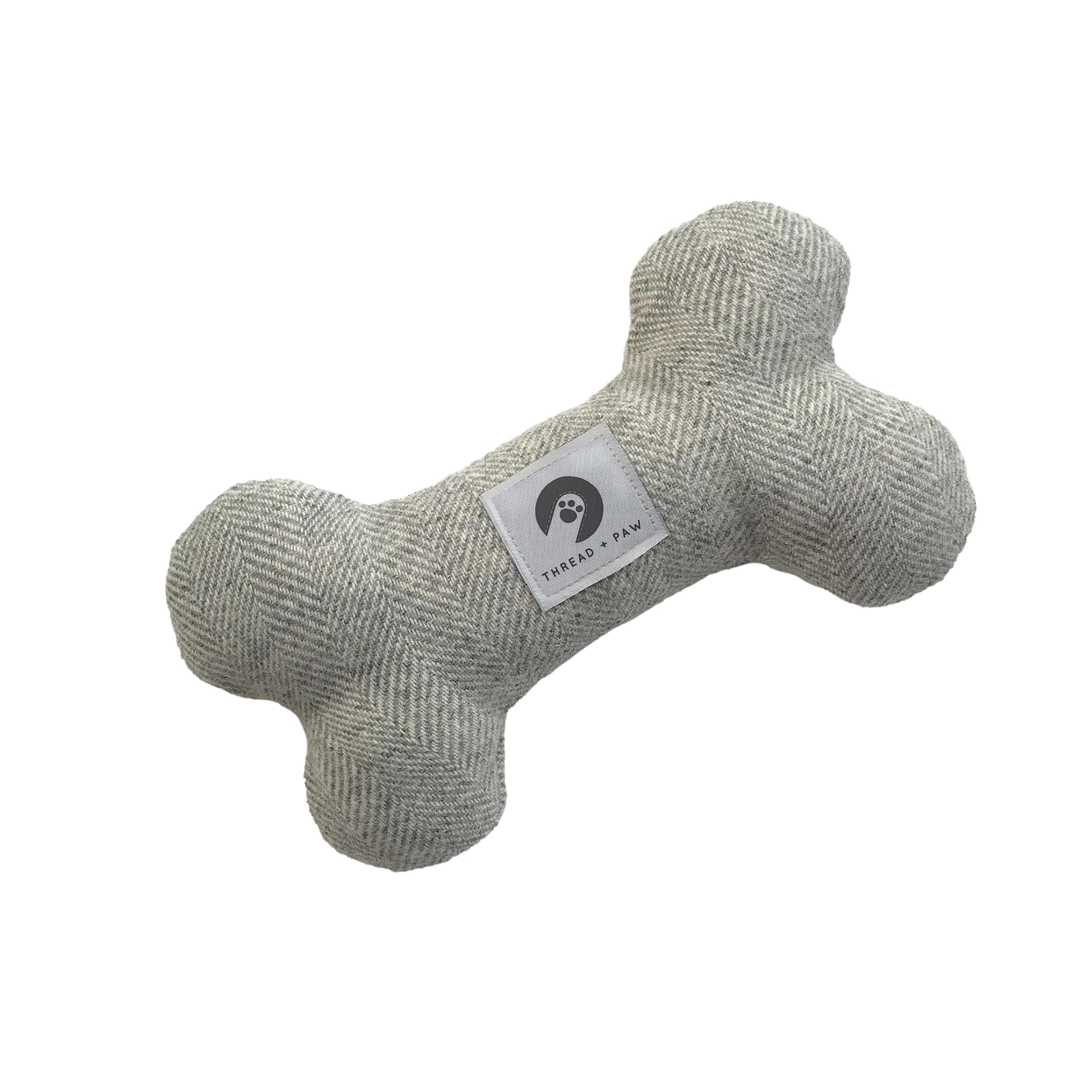 full view light grey tweed dog toy, white "Thread + Paw" label in front